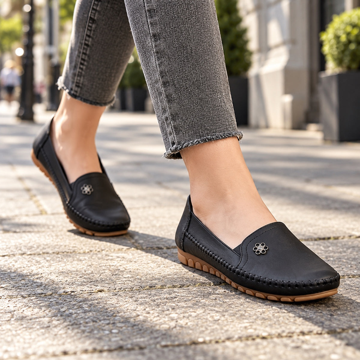 White – Unisex Slip-On Loafers, worn on a walk